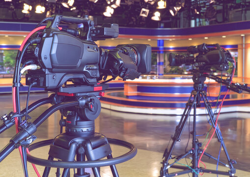 Broadcast cameras in a modern news studio