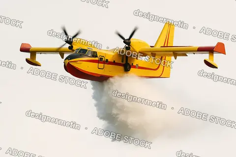 Yellow Firefighting Airplane Dropping Water From Sky During Emergency Action Against Dangerous Wildfire Flames Today