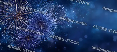 Blue Night Sky Filled With Golden And Purple Fireworks Bursting In Celebration Of New Year Festival