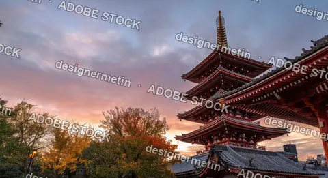 Traditional Japanese Asakusa Temple In Autumn Glow, Framed By Trees And Warm Pastel Sunset Sky