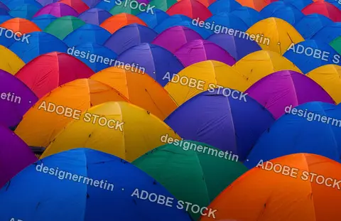 Vibrant Multicolored Camping Tents Arranged Closely Together In A Large Group At A Music Festival Or Event