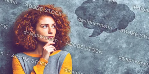 Thinking Redhead Woman Looking At Empty Thought Bubble On Gray Wall