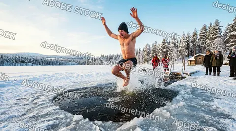 Man Jumping Into Ice Hole On Frozen Lake